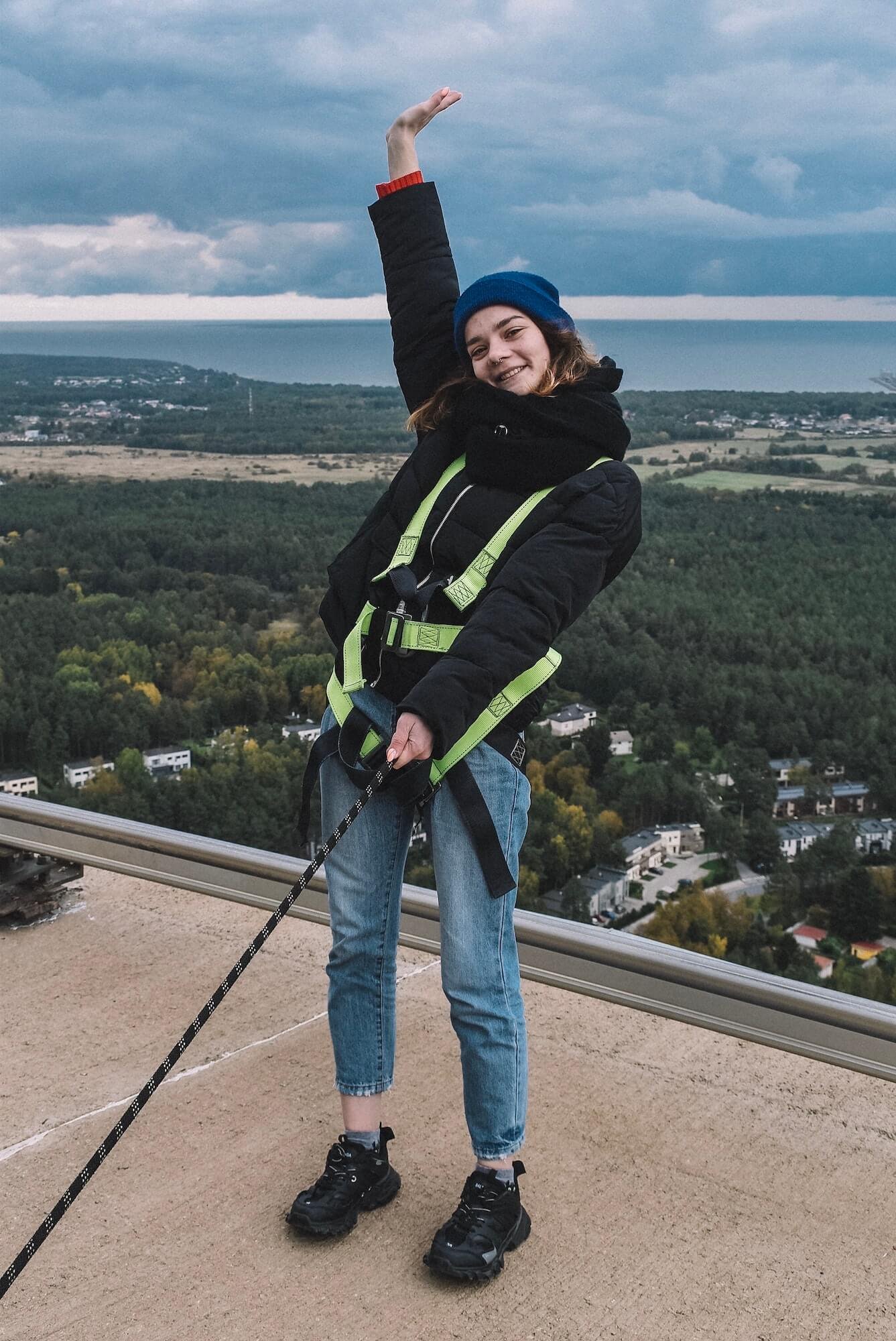 A Young Woman Walking On The Roof 1